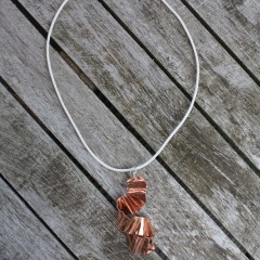 ‘Ruffles’  Polished Copper Pendant on Sterling Silver & White Leather necklace 16”